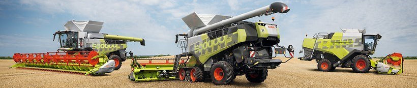 Claas комбайн на полі